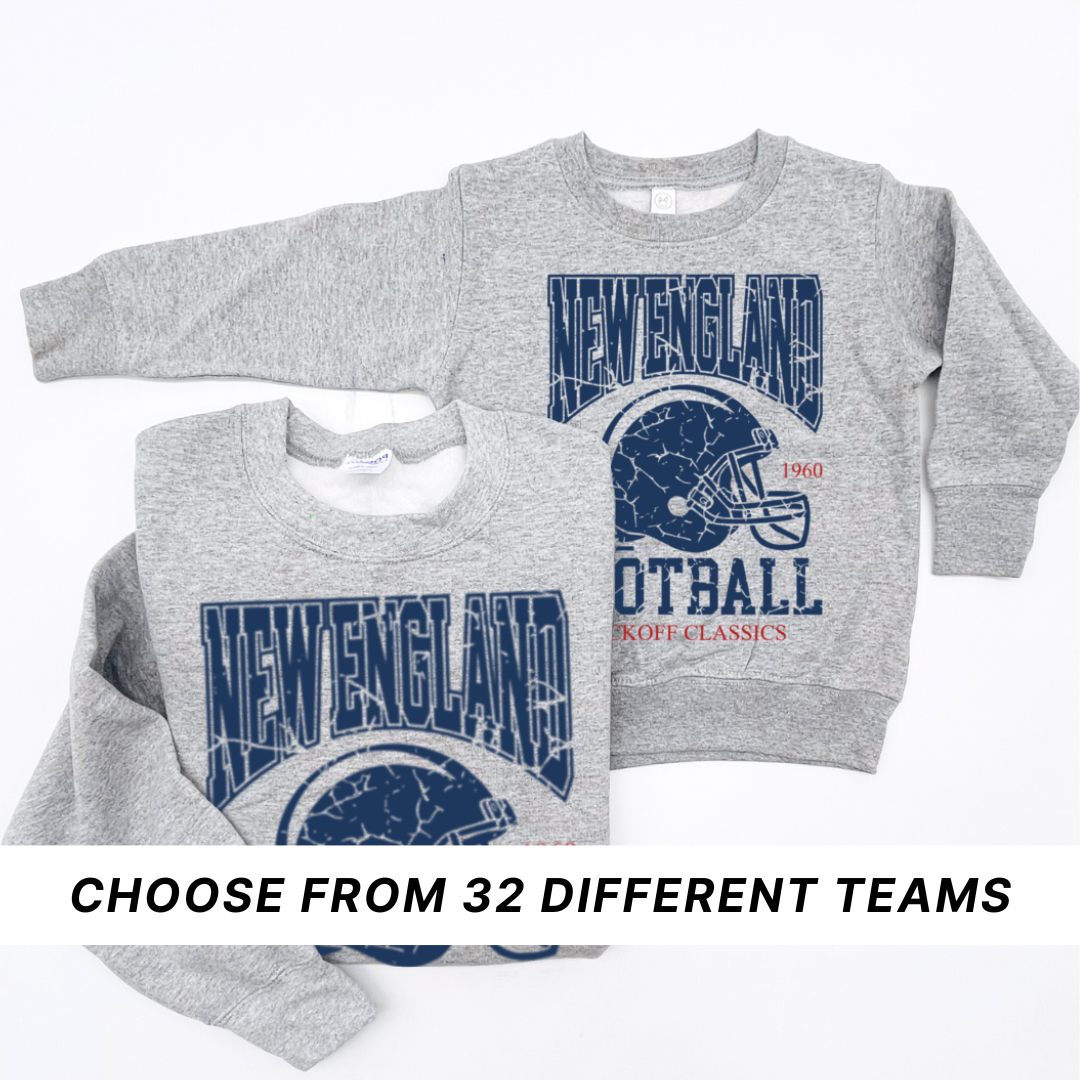 matching set of 2 heather light gray fleece pullovers, one for adult and one for child with the kickoff classics design featuring "new england football"and a banner that indicates you can choose your team