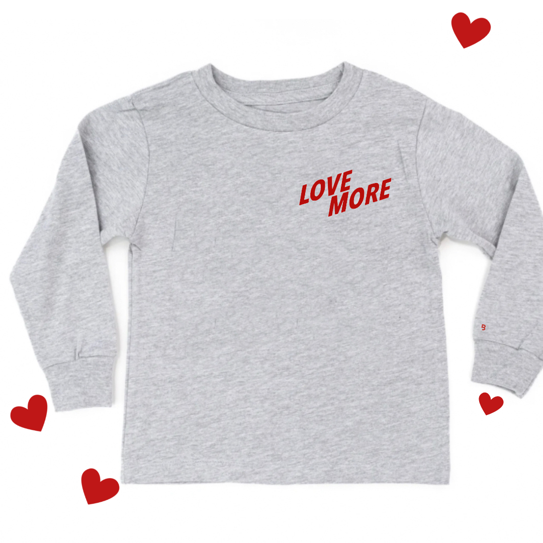 kids heather light gray long sleeve with the Love More graphic design on the front left chest