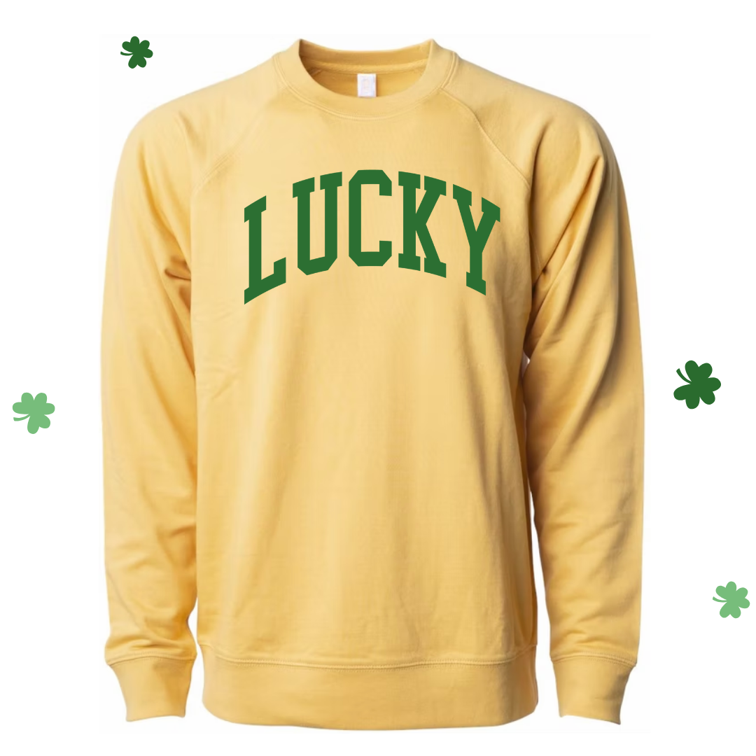 Golden yellow luxe terry crew pullover featuring the OG "Lucky" Varsity design in a classic varsity-style font.