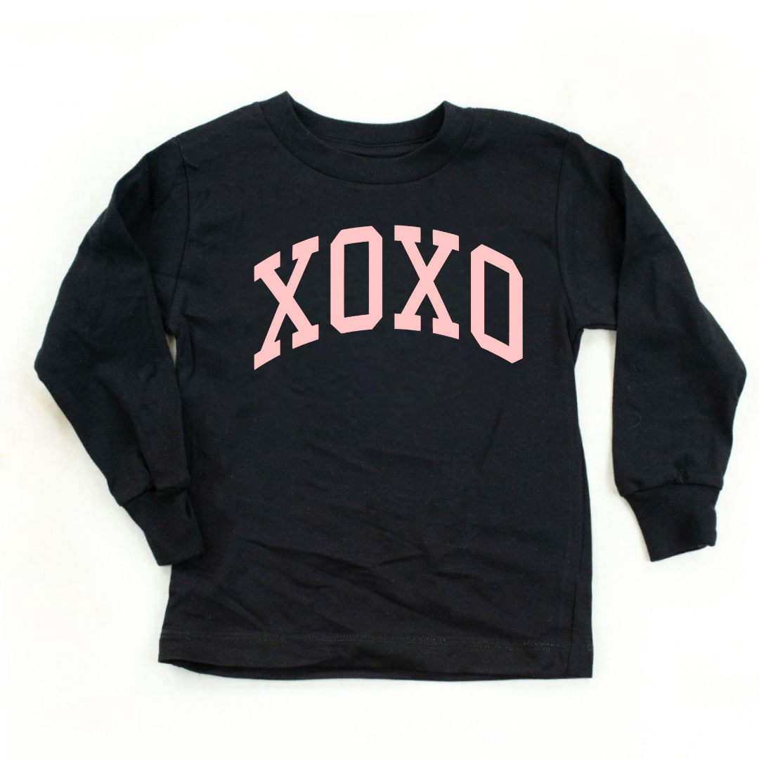 kids black long sleeve tee with XOXO graphic design in pink ink