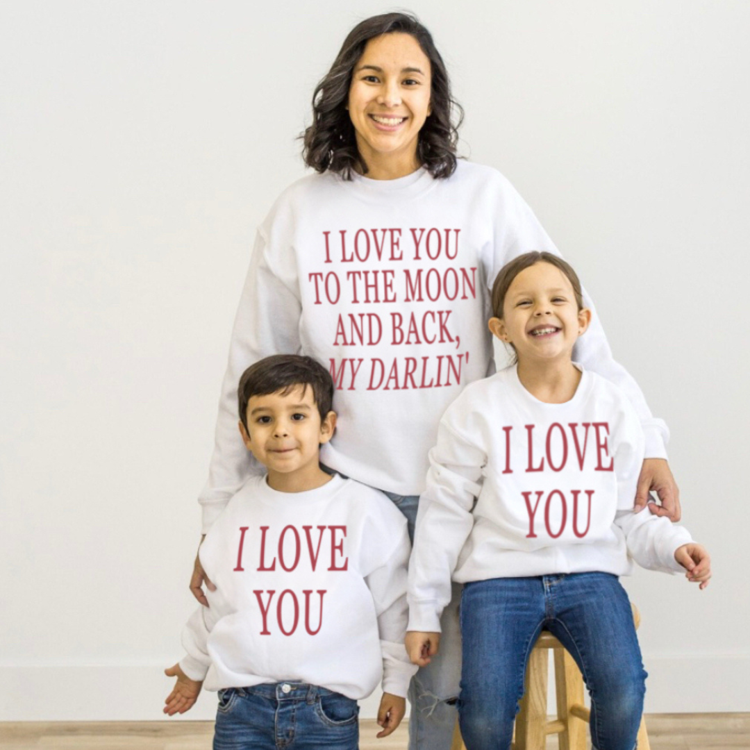 mom with her son and daughter modeling the matching fleece pullovers - the adult says "I love you to the moon and back my darlin'" and the two kids says "I love you"