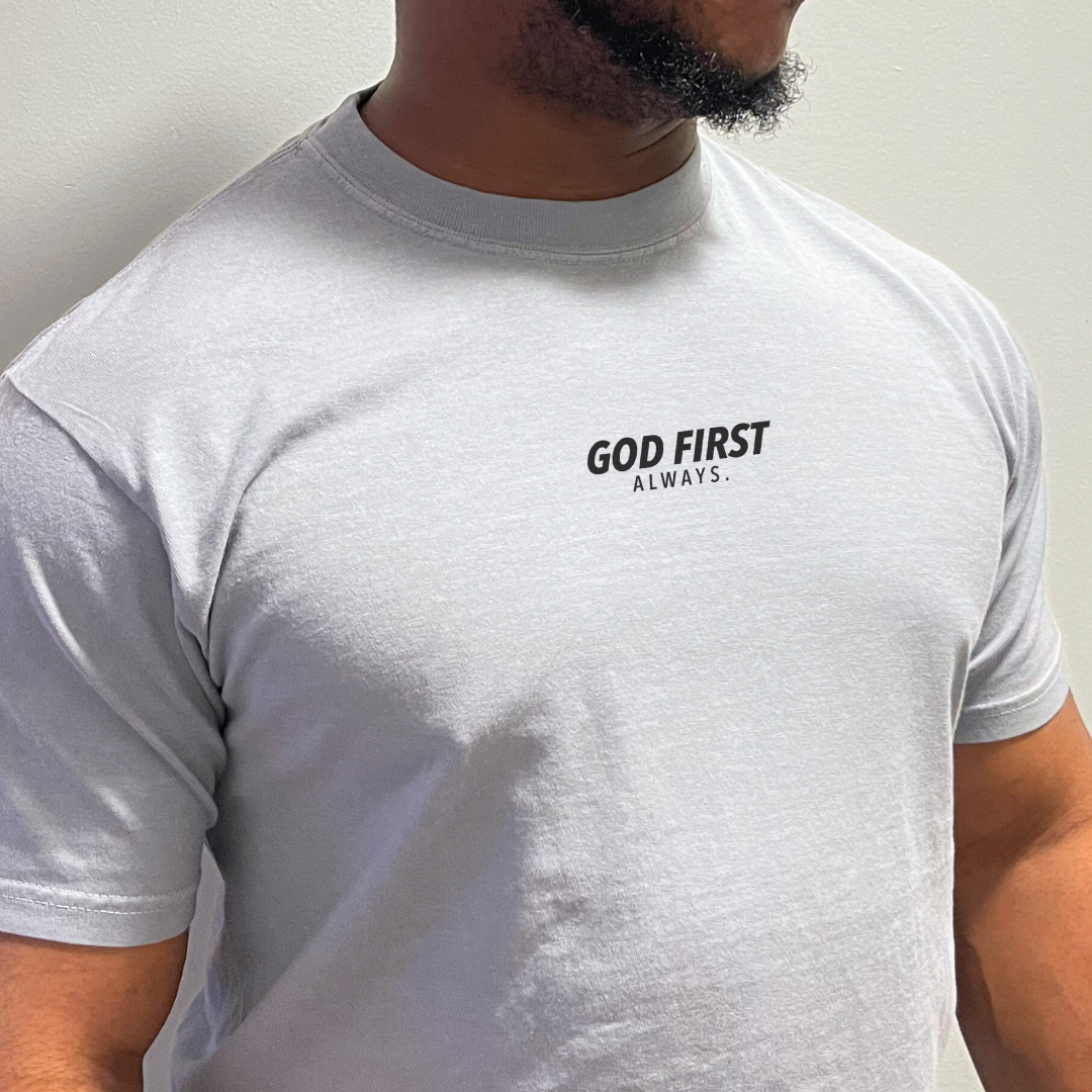 Adult premium graphic tee featuring subtle front chest text “God First, Always” from Branded & Labeled.