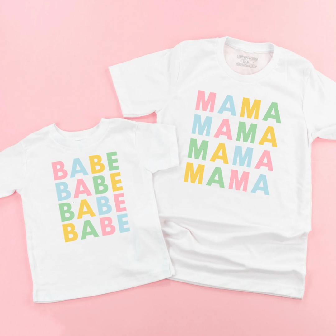 Matching mom and kids graphic tees featuring pastel “Mama” and “Babe” designs, shown side by side on natural colored shirts from the Branded & Labeled spring collection.