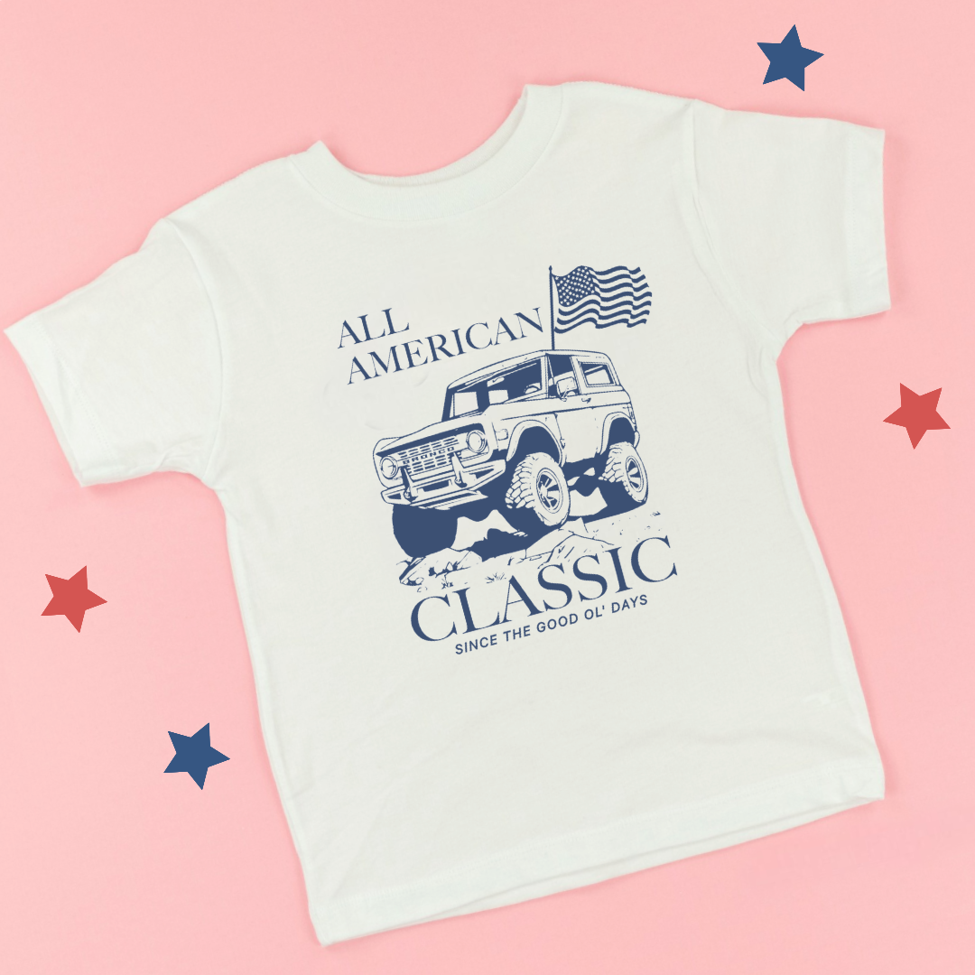 Kids graphic tee featuring a vintage bronco-style truck with “All American Classic: Since the Good Ol’ Days” text, part of the American Classics Collection by Branded & Labeled.
