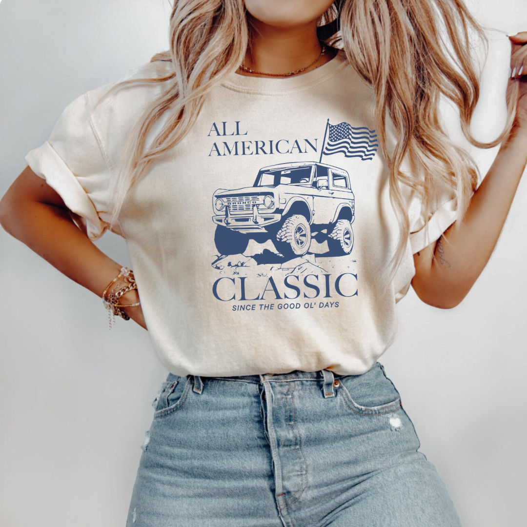 Adult everyday graphic tee featuring a vintage bronco-style truck with “All American Classic: Since the Good Ol’Days” text, part of the American Classics Collection by Branded & Labeled.