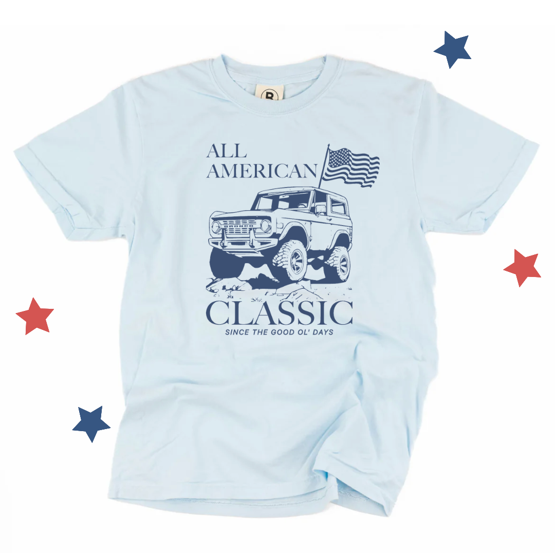 Adult premium graphic tee featuring a vintage bronco-style truck with “All American Classic: Since the Good Ol’ Days” text, part of the American Classics Collection by Branded & Labeled.