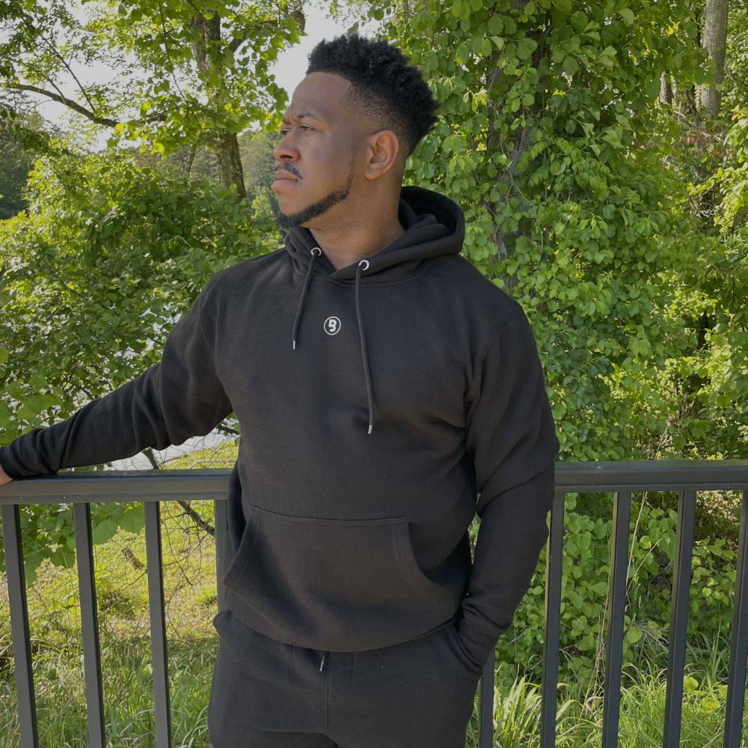 Unisex Black premium hooded pullover with signature B logo detail from Branded & Labeled