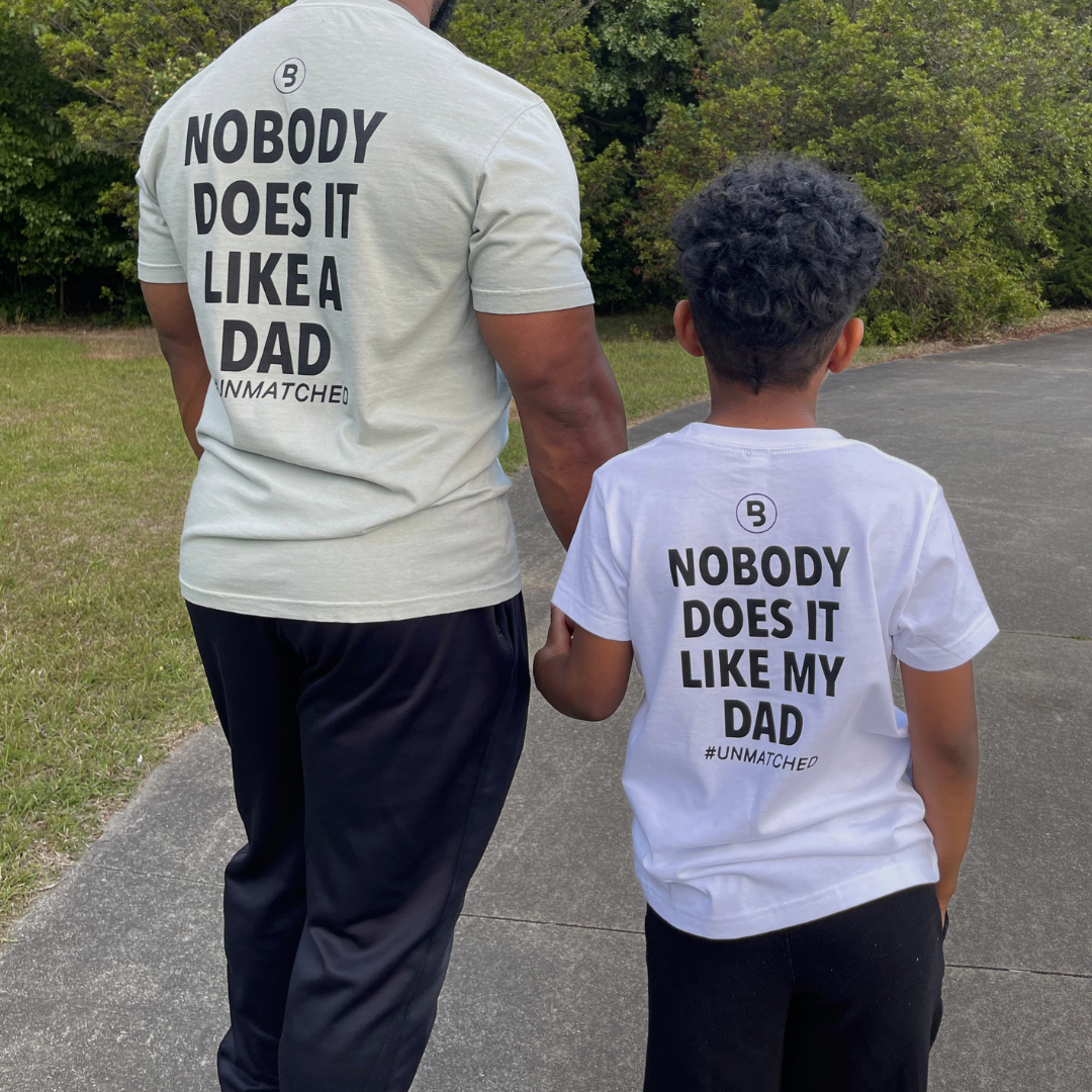 Nobody Does It Like My Dad kids graphic tee with ESTD year detail from Branded & Labeled